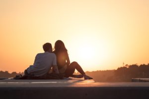 Man and Woman Looking at Sunset - Dating Relationship Standards Introverted Alpha
