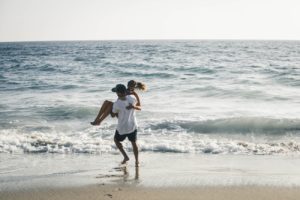 Couple on beach - what is masculinity