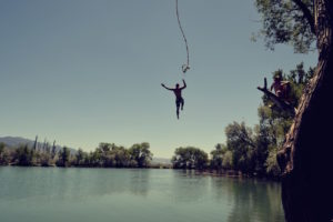Man jumping into lake - Adventurous Side