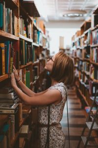 Woman In Bookstore (full) - Conversation Starters