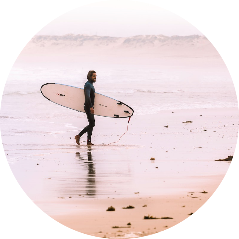 Circle Man with surfboard on beach - Rock Solid Confidence - Introverted Alpha