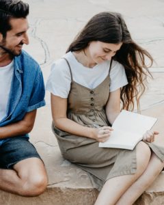 Man and Woman Sitting - How to Flirt