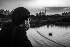 Man Overlooking Water and Thinking - Analysis Paralysis